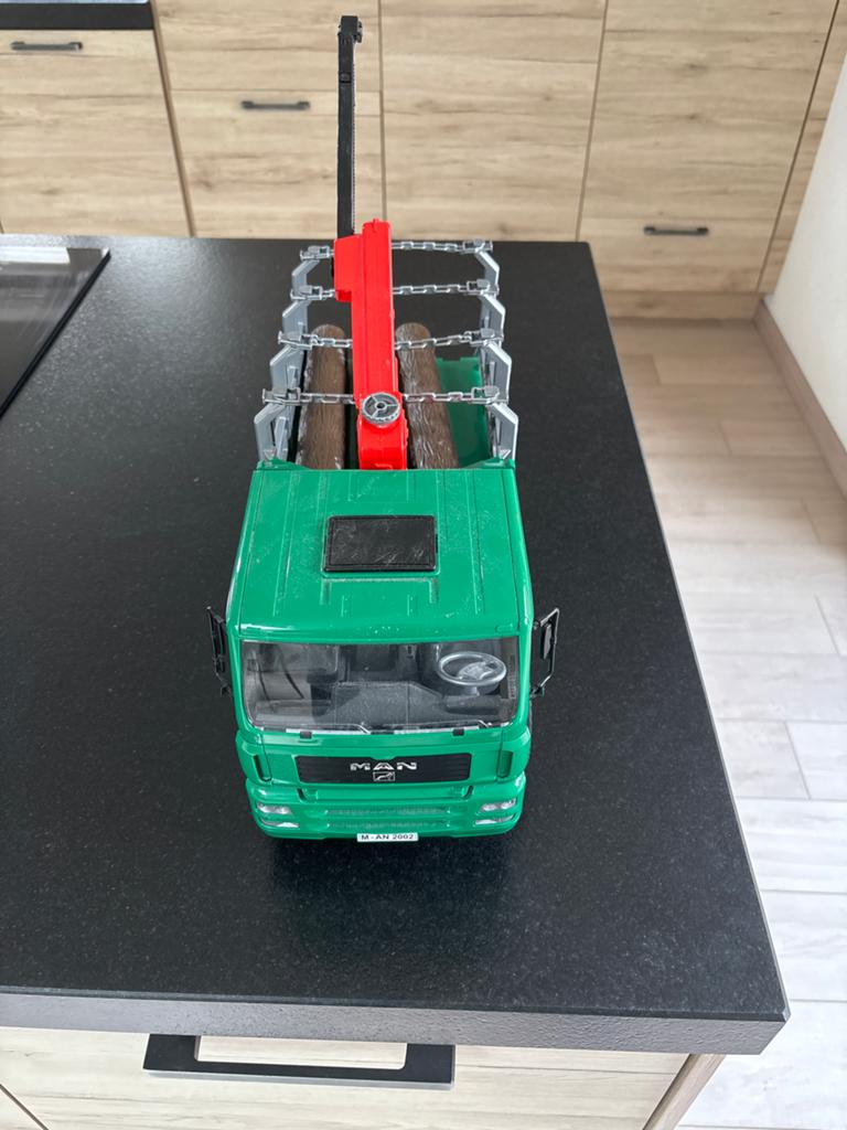Bruder MAN Houttransportwagen met kraan en 3 boomstammen, Ophalen, Gebruikt