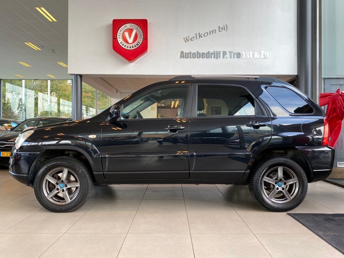 Kia Sportage 2.0 CVVT X-ecutive,Navigatie,Climate&Cruisecont, Auto's, 1442 kg, Stof, 4 cilinders, Zwart