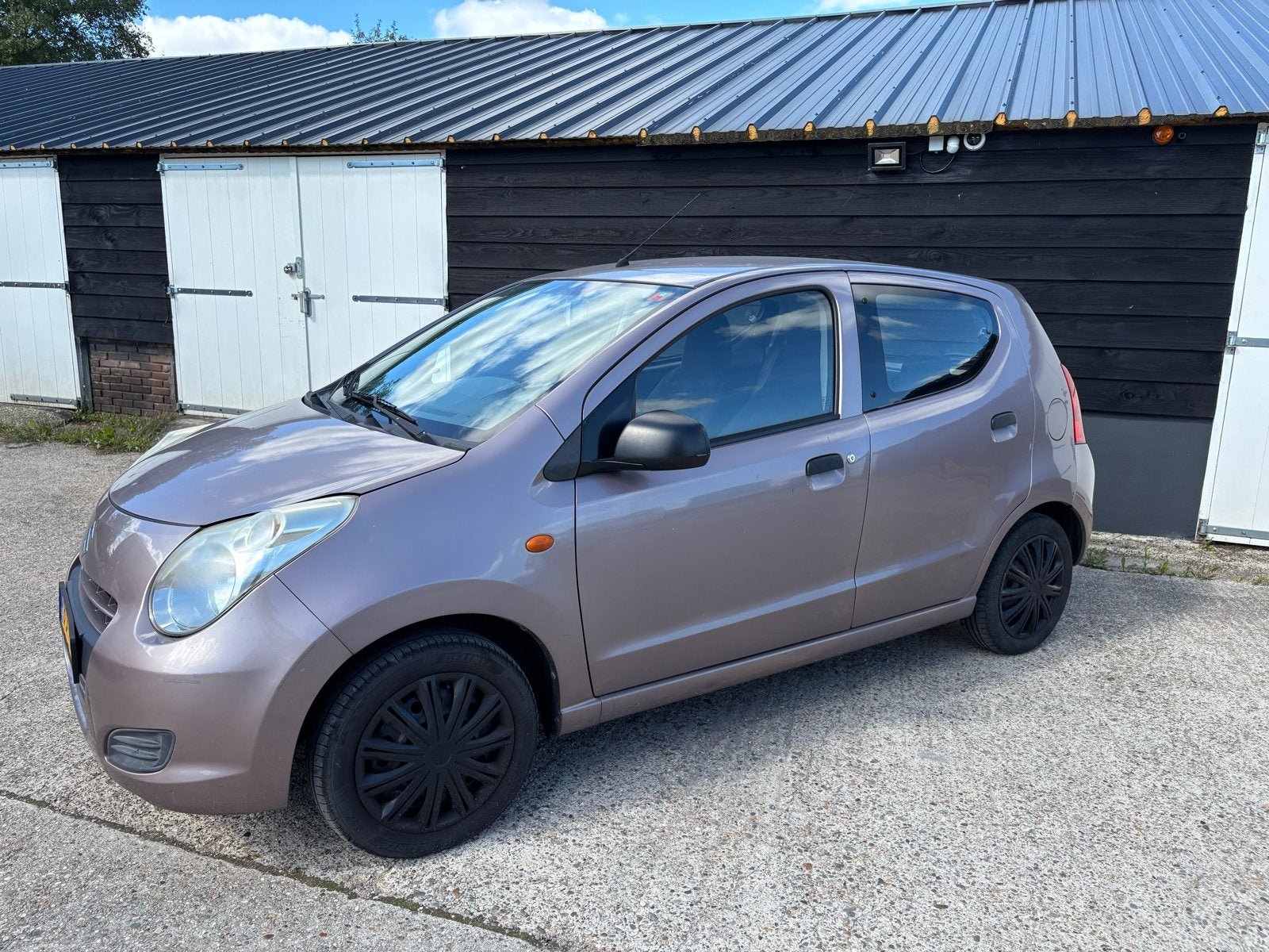 Suzuki Alto 1.0 2009 - CRUISE CONTROL, AIRCO, Voorwielaandrijving, 200 kg, Bruin, 4 stoelen
