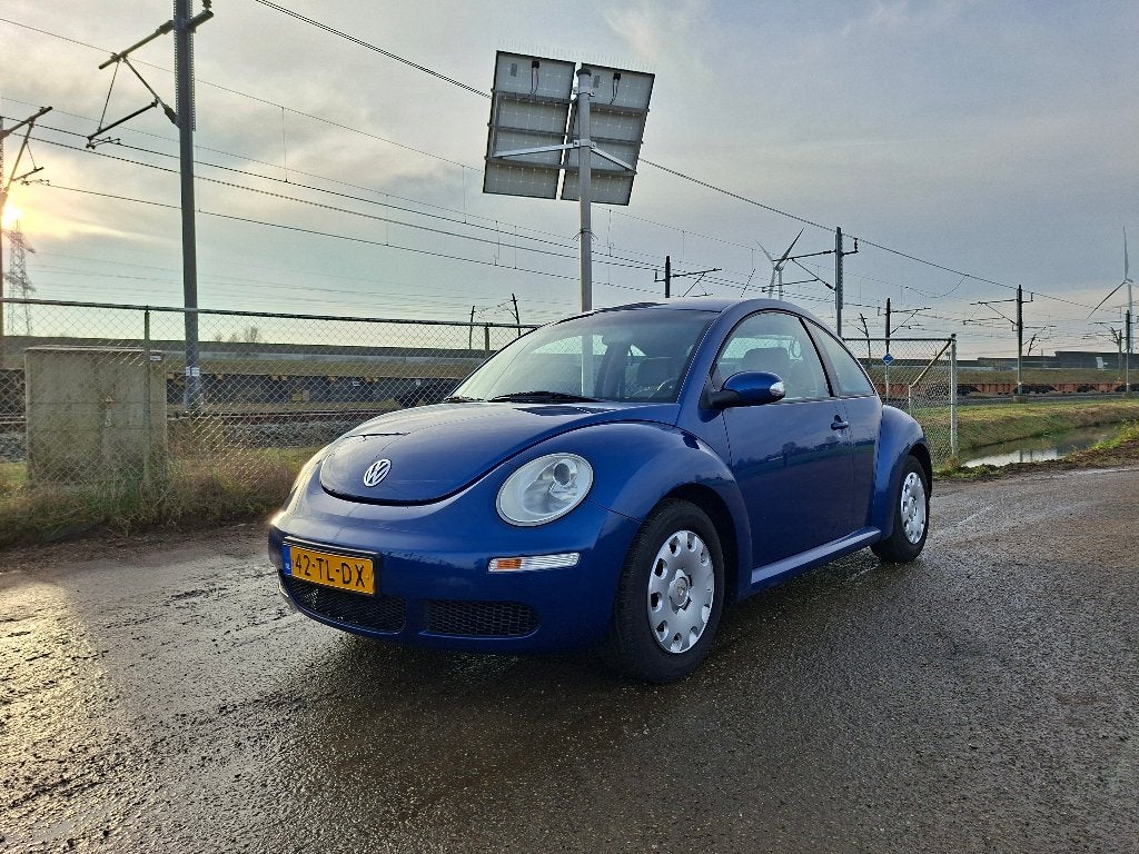 Volkswagen Beetle (Kever) 1.4 55KW 2006 Blauw Airco, Voorwielaandrijving, Stof, 74 pk, Beetle (Kever)