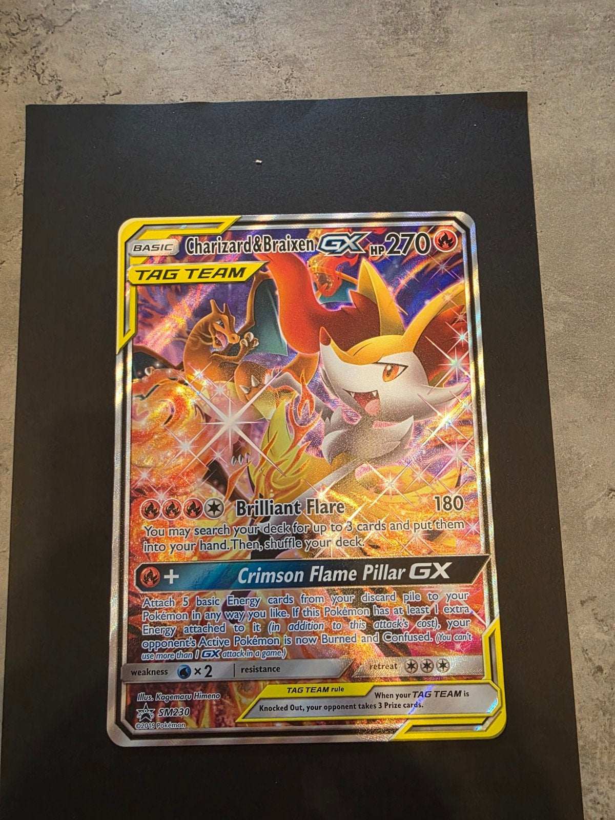 Pokemon jumbo charizard&braixen gx tagteam, Ophalen of Verzenden, Nieuw, Losse kaart