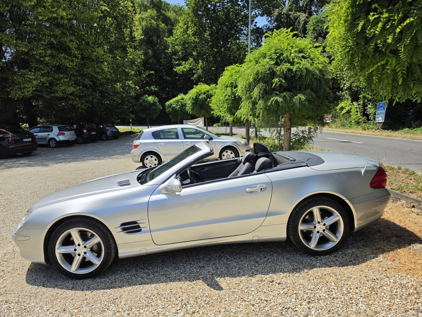 Mercedes-Benz SL 500 NL auto Full option in perfecte staat, Auto's, Mercedes-Benz, Achterwielaandrijving, Cabriolet, 4966 cc, 1745 kg