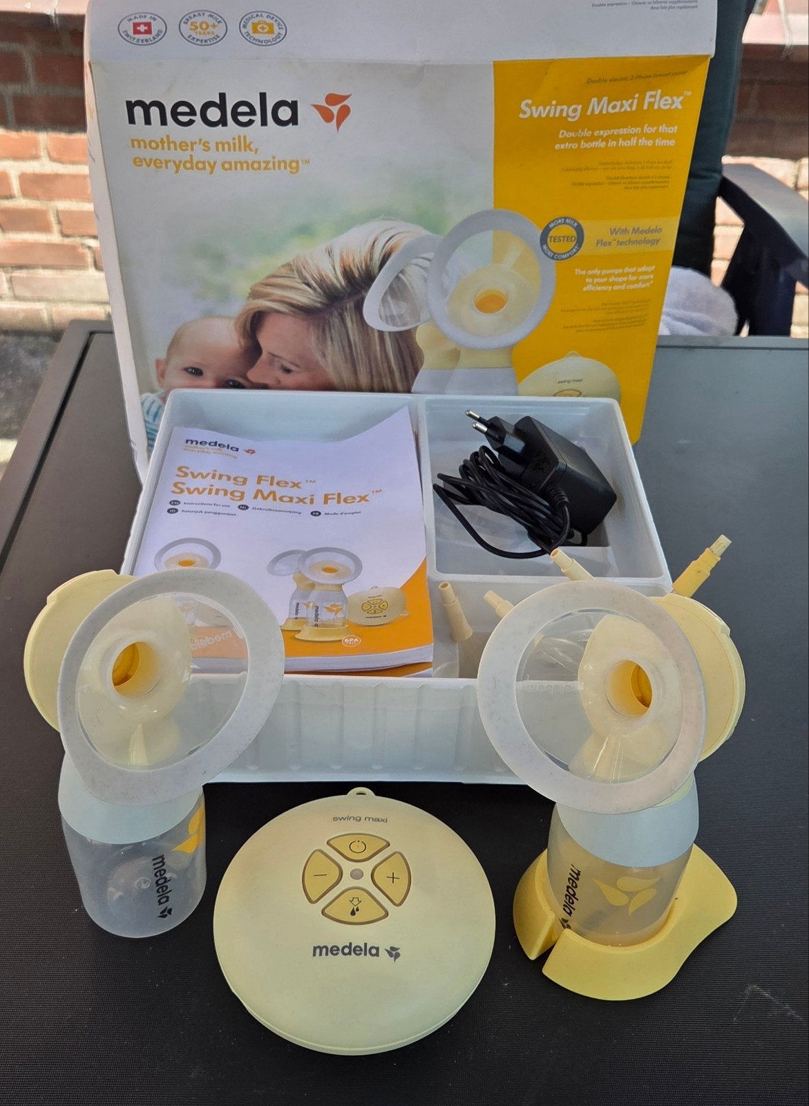 Medela Swing Maxi Flex dubbele elektrische borstkolf, Ophalen