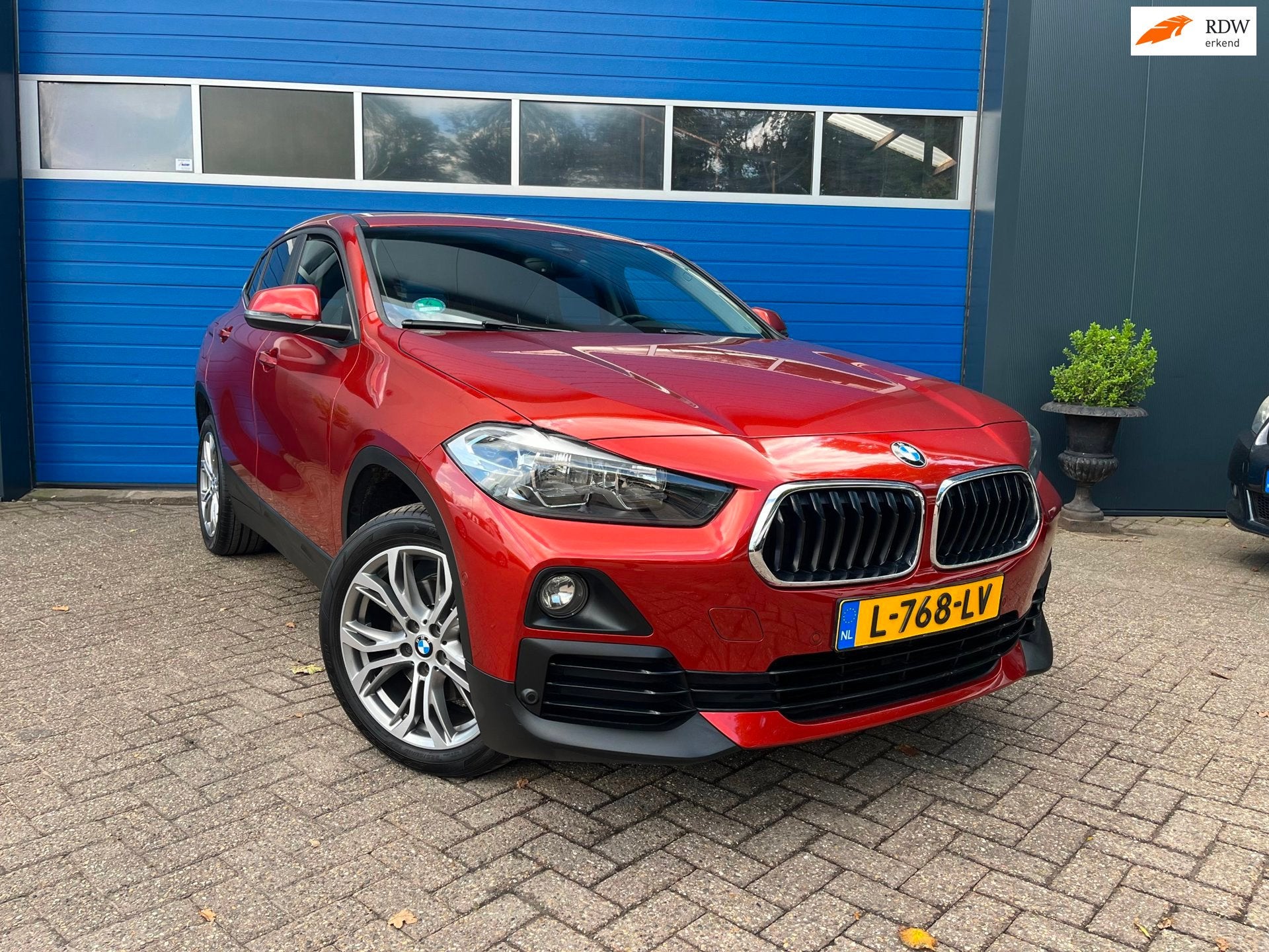 BMW X2 SDrive18i High Executive Automaat|Navi|Climate, Auto's, Gebruikt, Overige kleuren, 3 cilinders, 725 kg