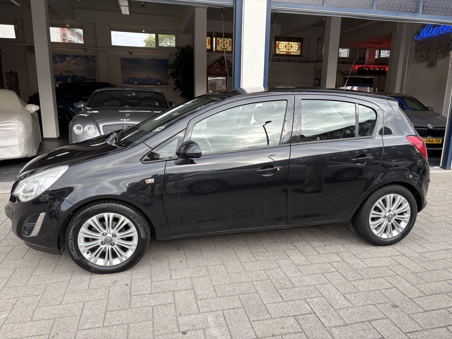 Opel Corsa 1.4-16V Cosmo 1E EIG/NAP/DEALER OND/NAVI/CLIMA/5, Auto's, Voorwielaandrijving, Euro 5, Gebruikt, 4 cilinders