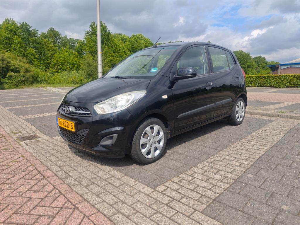 Hyundai i10 1.1 2011 Zwart - APK tot april 2027, Auto's, Hyundai, Stof, 4 cilinders, 400 kg, Zwart