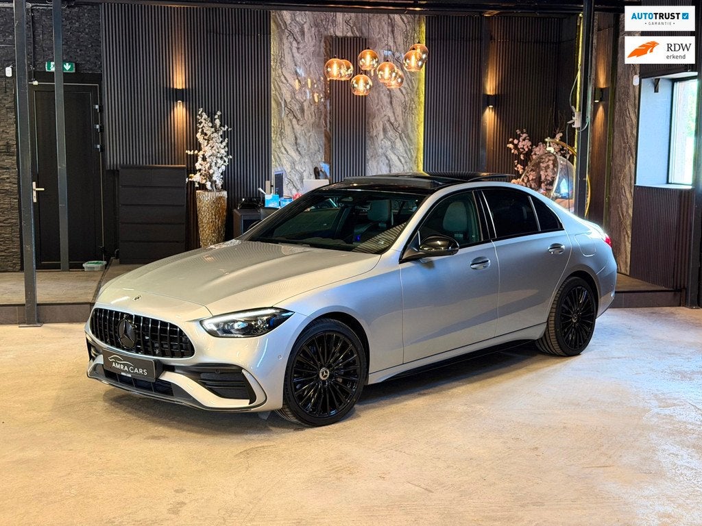 Mercedes-Benz C-klasse 300 e AMG|PANO|MEMORY|BURMESTER|FULL, Auto's, Mercedes-Benz, Automaat, Achterwielaandrijving, Euro 6, 4 cilinders