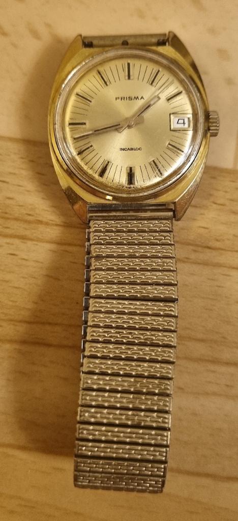 Vintage mechanische Prisma vergulde herenhorloge., Overige merken, Met bandje, Polshorloge, 1960 of later