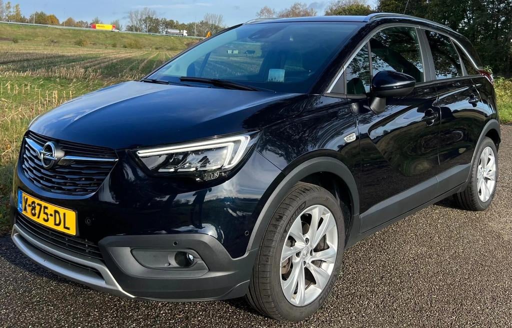 Opel Crossland X 1.2 Turbo Ultimate 2019 131 PK NAVI APPEL C, Auto's, Gebruikt, 1199 cc, USB, Blauw