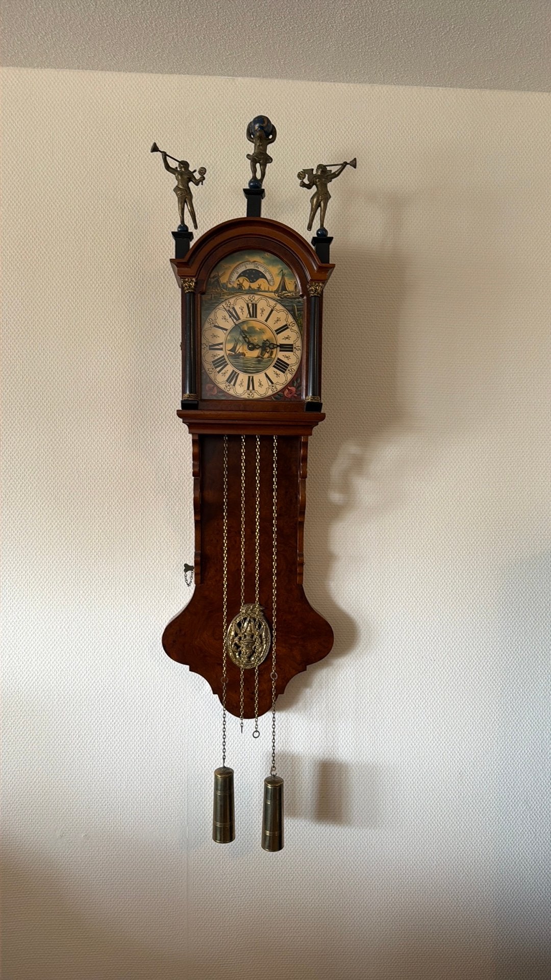 Friese staartklok/wandklok, Ophalen