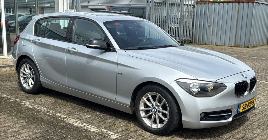 BMW 1-serie 116i Business+ Sport, 1-Serie, Euro 5, Gebruikt, Zwart