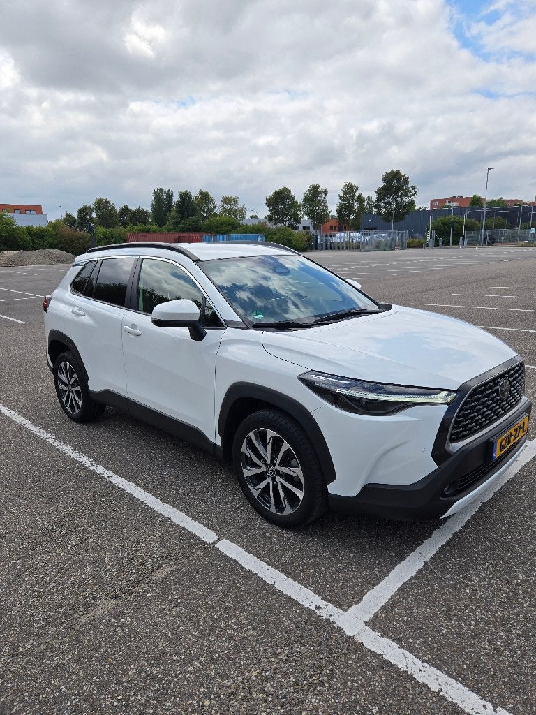 Toyota Corolla Cross 1.8 High Power Hybrid 140pk CVT 2024, Stof, 4 cilinders, Wit, Grijs