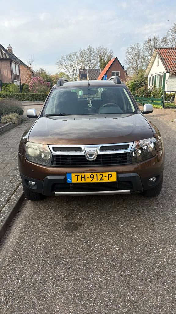 Dacia Duster 1.6 16V 4X4 2011 Bruin, Auto's, Dacia, 13 km/l, 4 cilinders, 1317 kg, Handgeschakeld