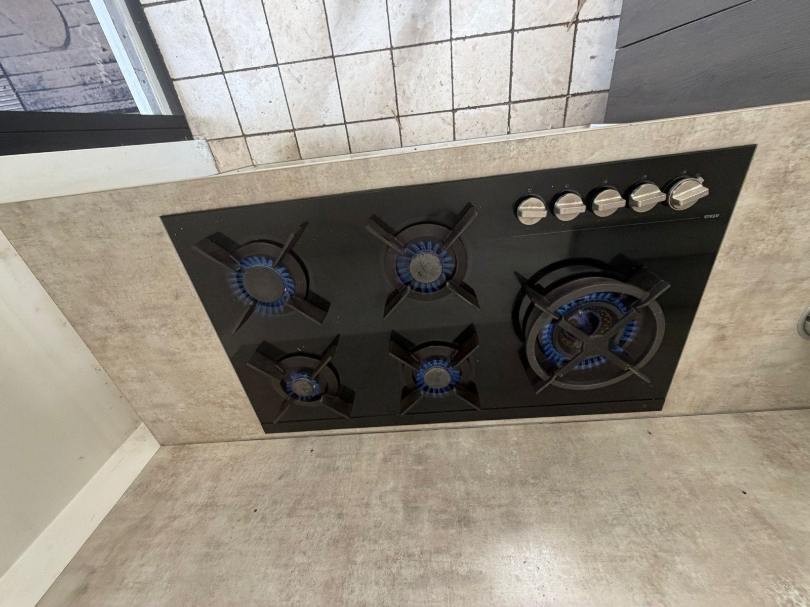 ATAG Kookplaat op glas met wokbrander, Ophalen, Gebruikt, Inbouw, Gas