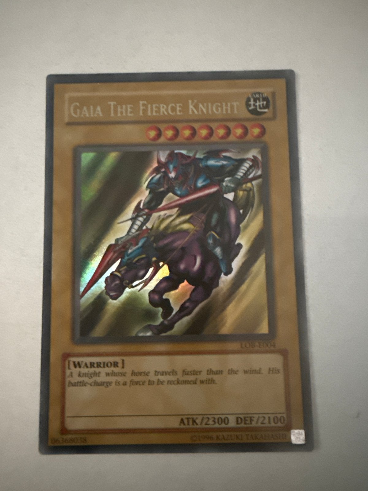 Yu-Gi-Oh! Gaia The Fierce Knight LOB-E004 Foil, Ophalen of Verzenden, Gebruikt, Losse kaart, Foil