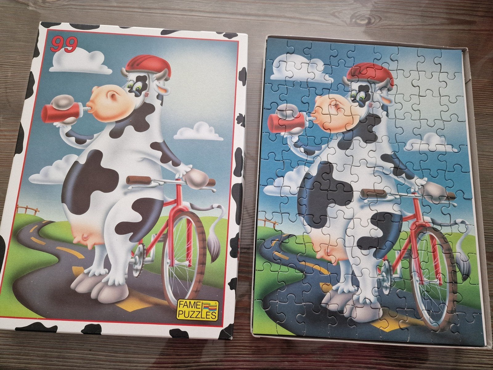 Leuke koe op fiets puzzel - 99 stukjes, Ophalen, Minder dan 500 stukjes, Gebruikt, Legpuzzel