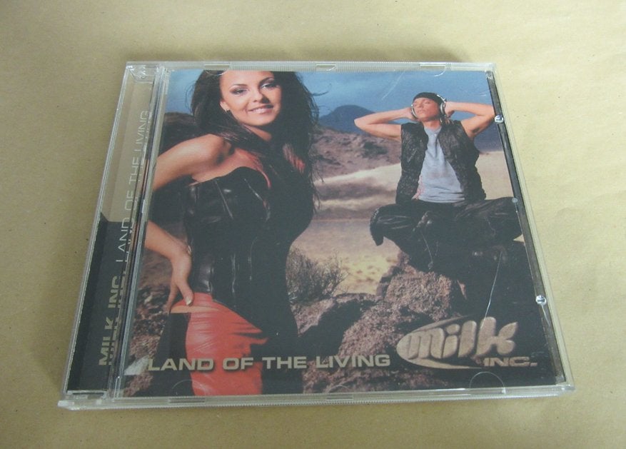 Milk Inc cd Land of the living, Verzenden, Zo goed als nieuw, Overige genres