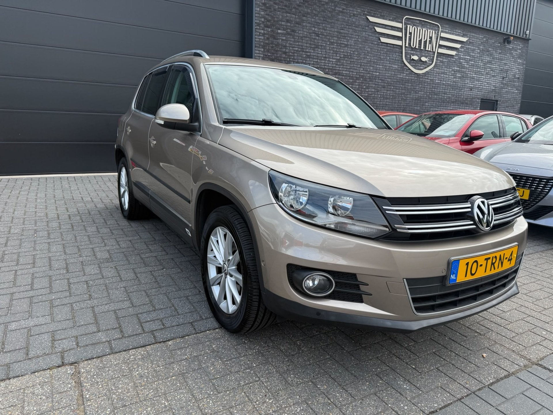 Volkswagen Tiguan 1.4 TSI Sport&Style | 1E EIGENAAR | 12MND, Voorwielaandrijving, Euro 5, 15 km/l, 4 cilinders