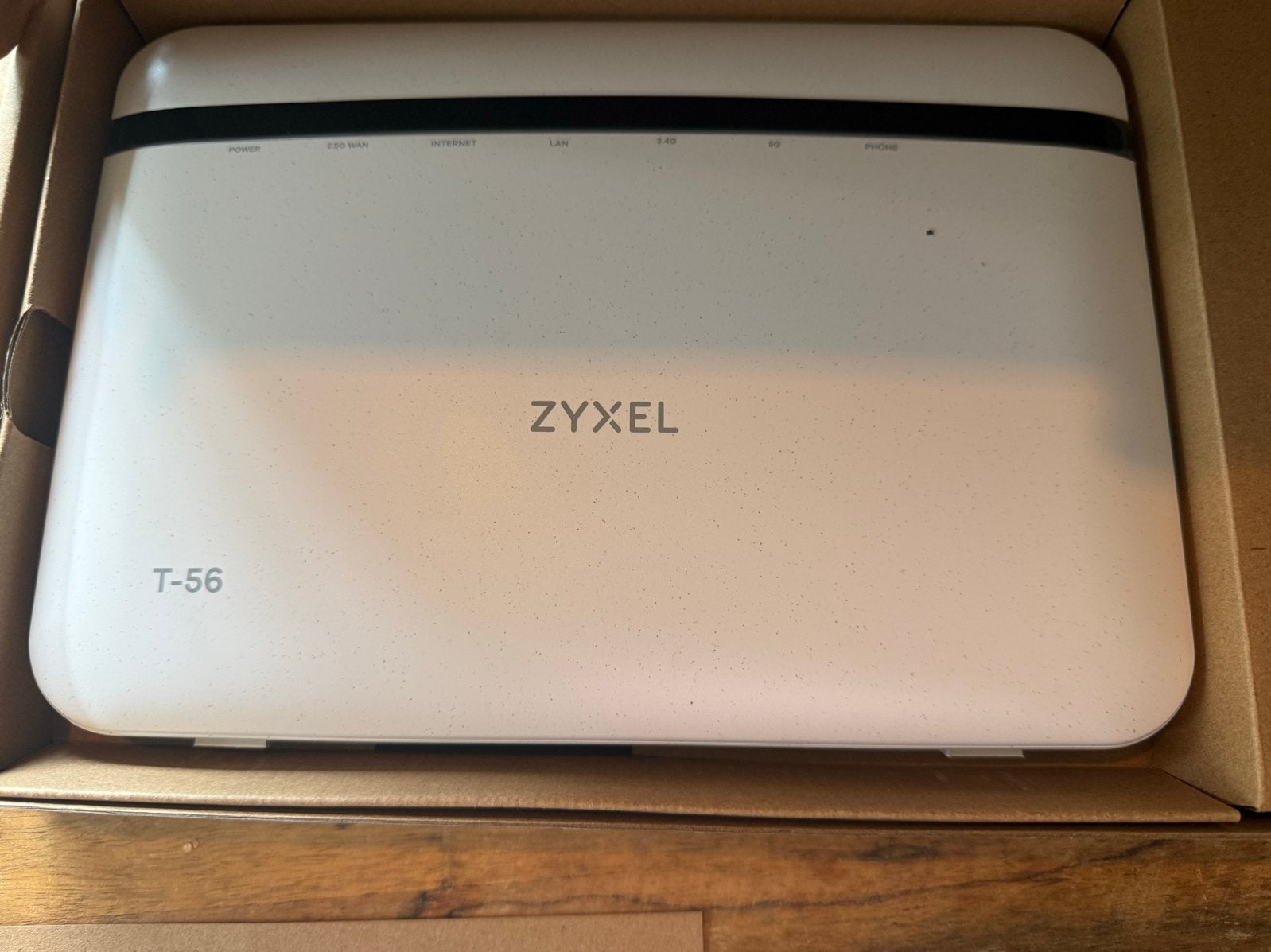Zyxel T-56 Dual-Band Wireless AX6000 2.5G Ethernet Modem, Computers en Software, Ophalen, Nieuw, Router met modem