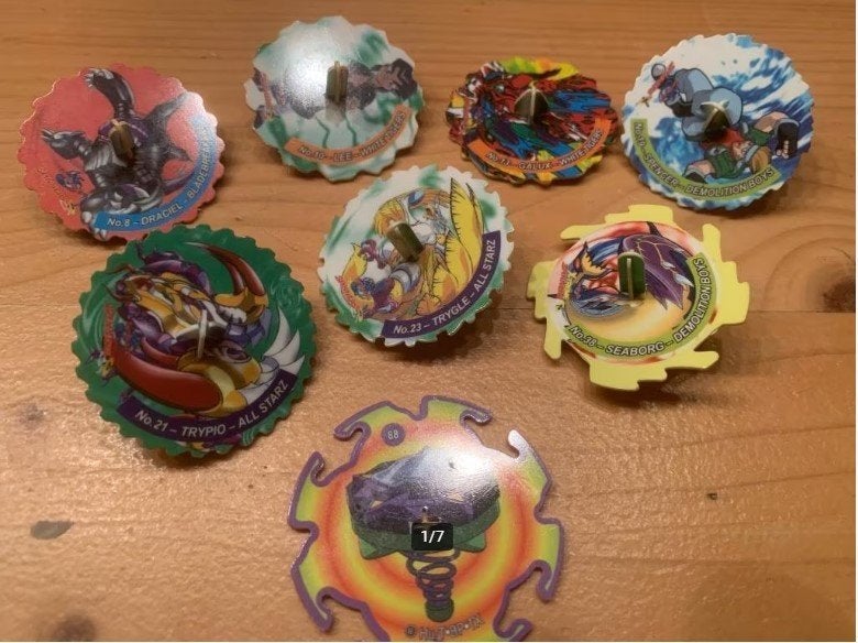 8x vintage Beyblade Tazo Spinners Draciel, Lee, Trypio e.a., Ophalen of Verzenden, Gebruikt
