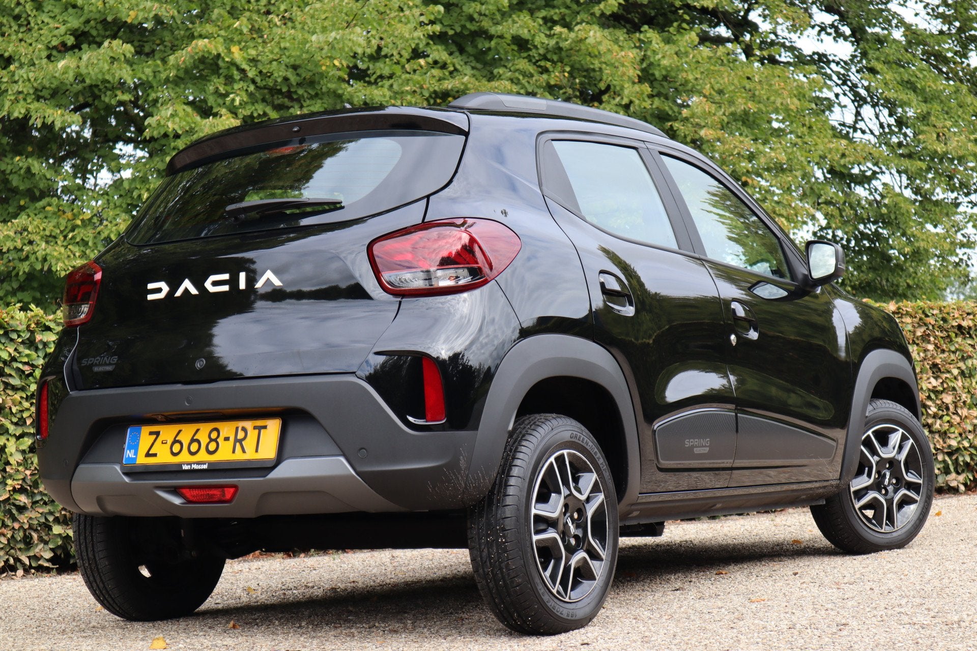 Dacia Spring Expression 27 kWh | Carplay | Camera | Lederen, Auto's, Dacia, 12 maanden, Gebruikt, 234 min, Zwart