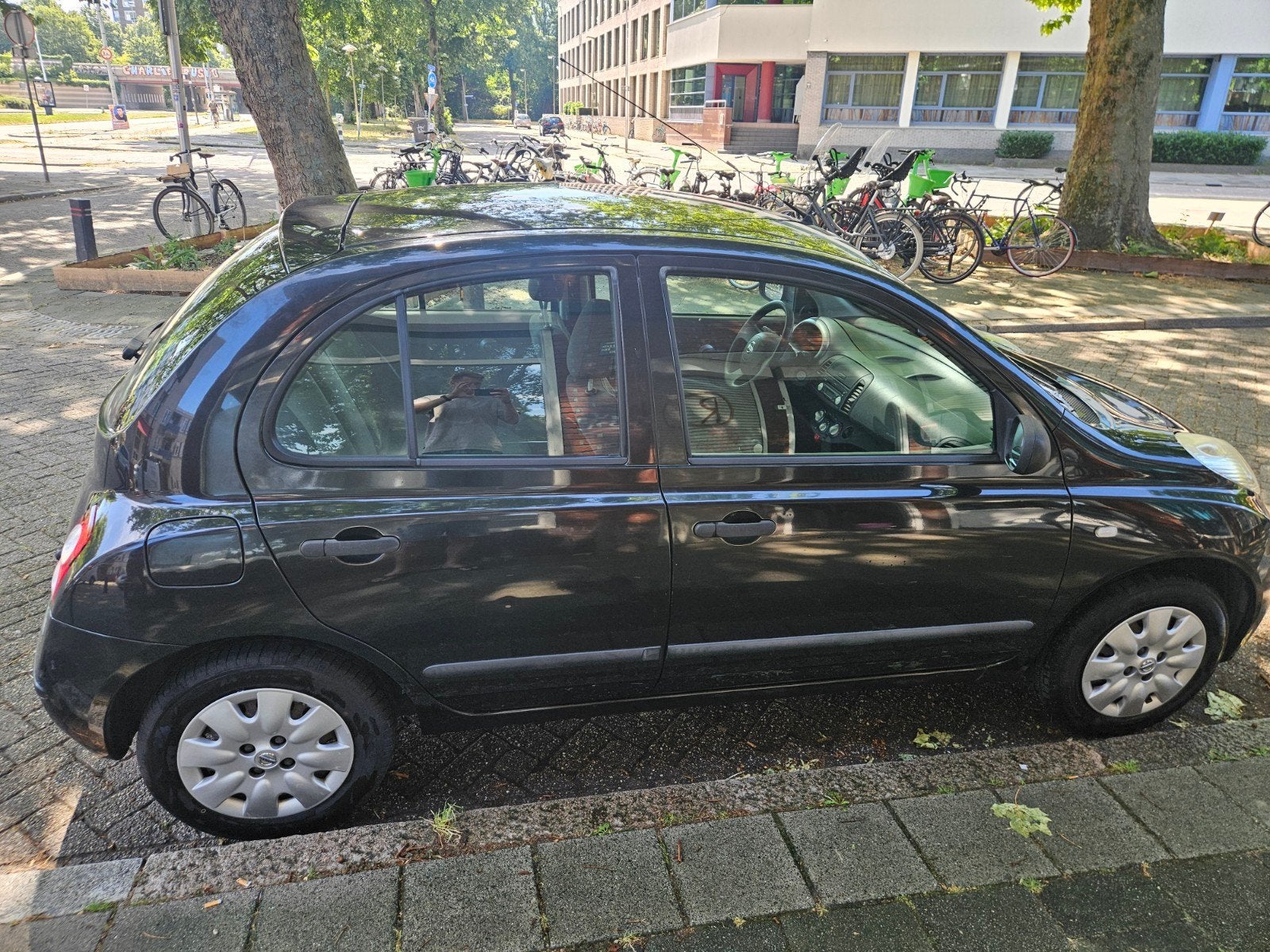Nissan Micra 1.2 48KW 5DR 2006 Zwart, Auto's, Nissan, 40 €/maand, 4 cilinders, Zwart, Origineel Nederlands