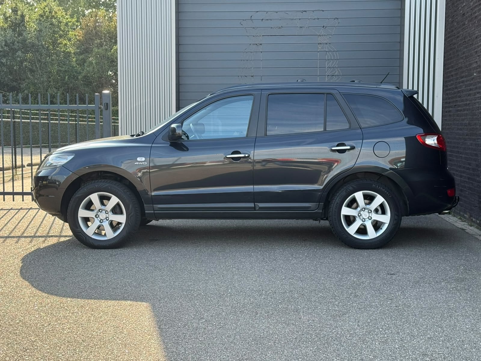 Hyundai Santa Fe 2.7i V6 4WD Freestyle Ecc|Automaat|Navi, Auto's, Automaat, Gebruikt, 2000 kg, Zwart
