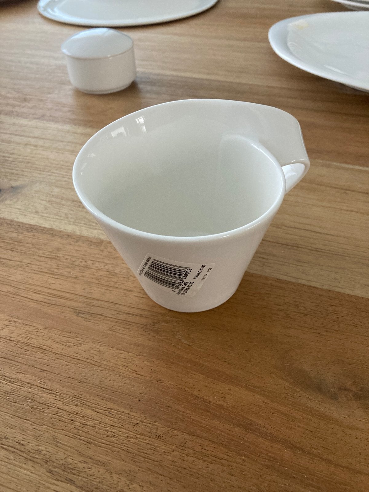 Witte porseleinen kop met uniek design nieuw, Huis en Inrichting, Keuken | Servies, Ophalen of Verzenden, Zo goed als nieuw, Porselein
