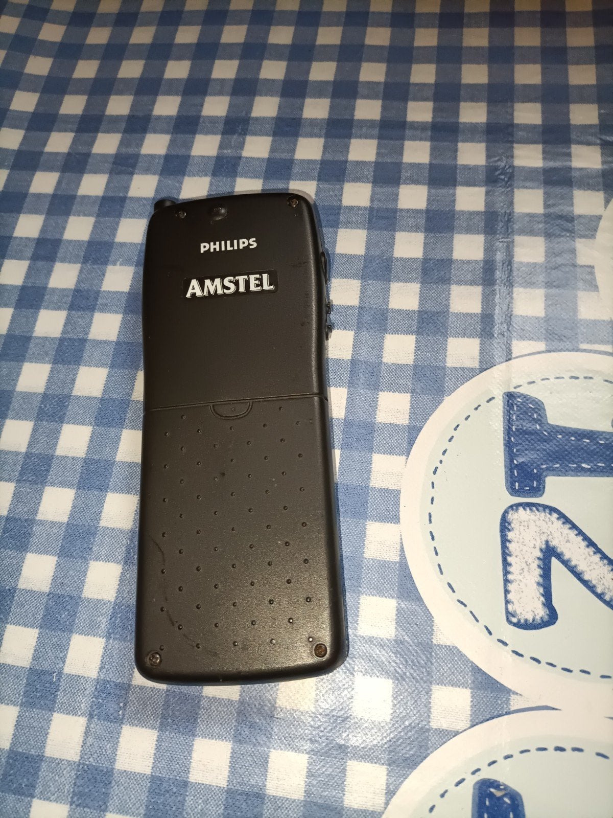 Opener voor bierflesjes Amstel Philips telefoon gsm, Ophalen of Verzenden, Zo goed als nieuw