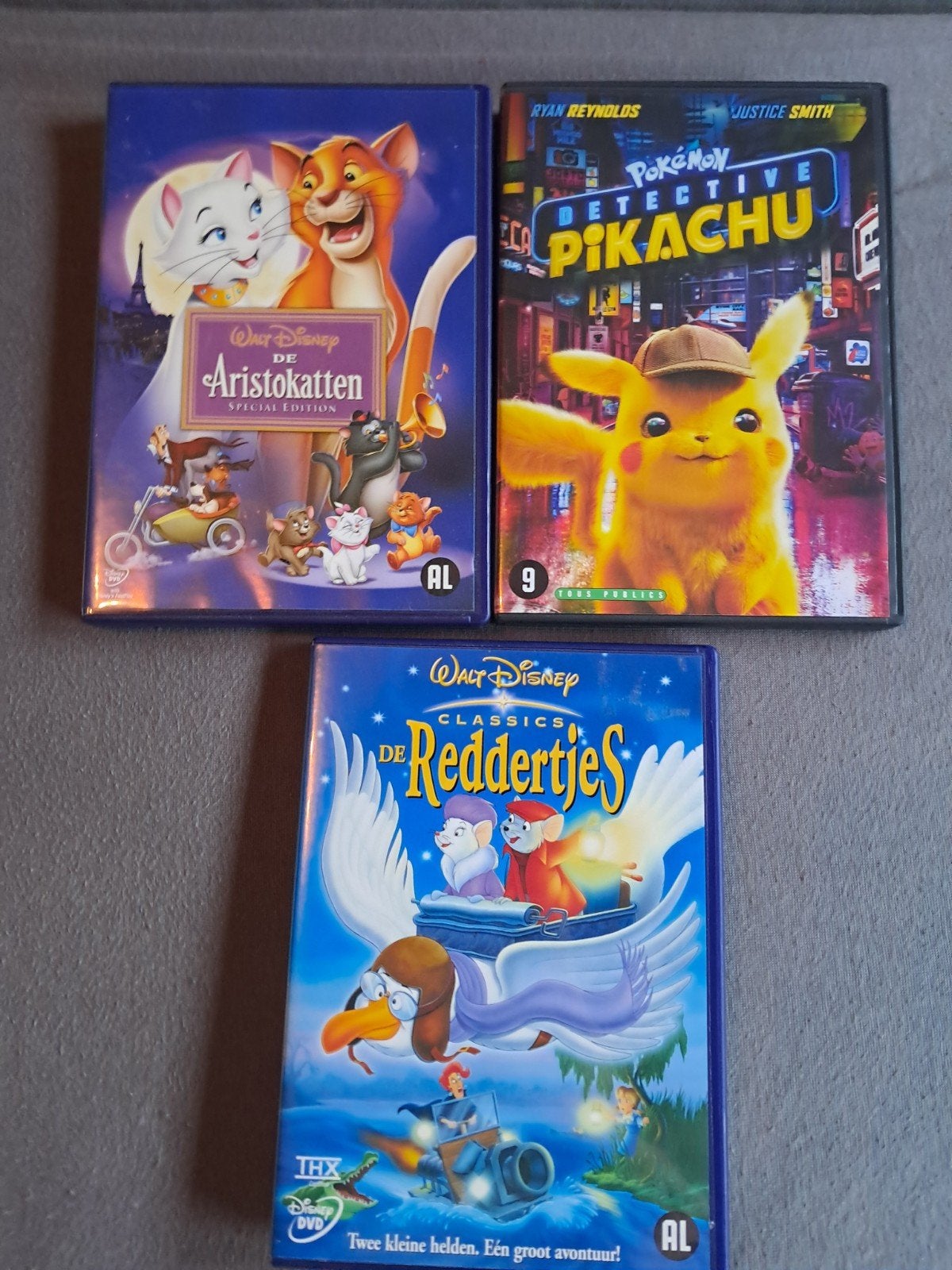2 Disney dvd's De Aristokatten en De Reddertjes + Pikachu., Alle leeftijden, Ophalen of Verzenden, Zo goed als nieuw, Europees