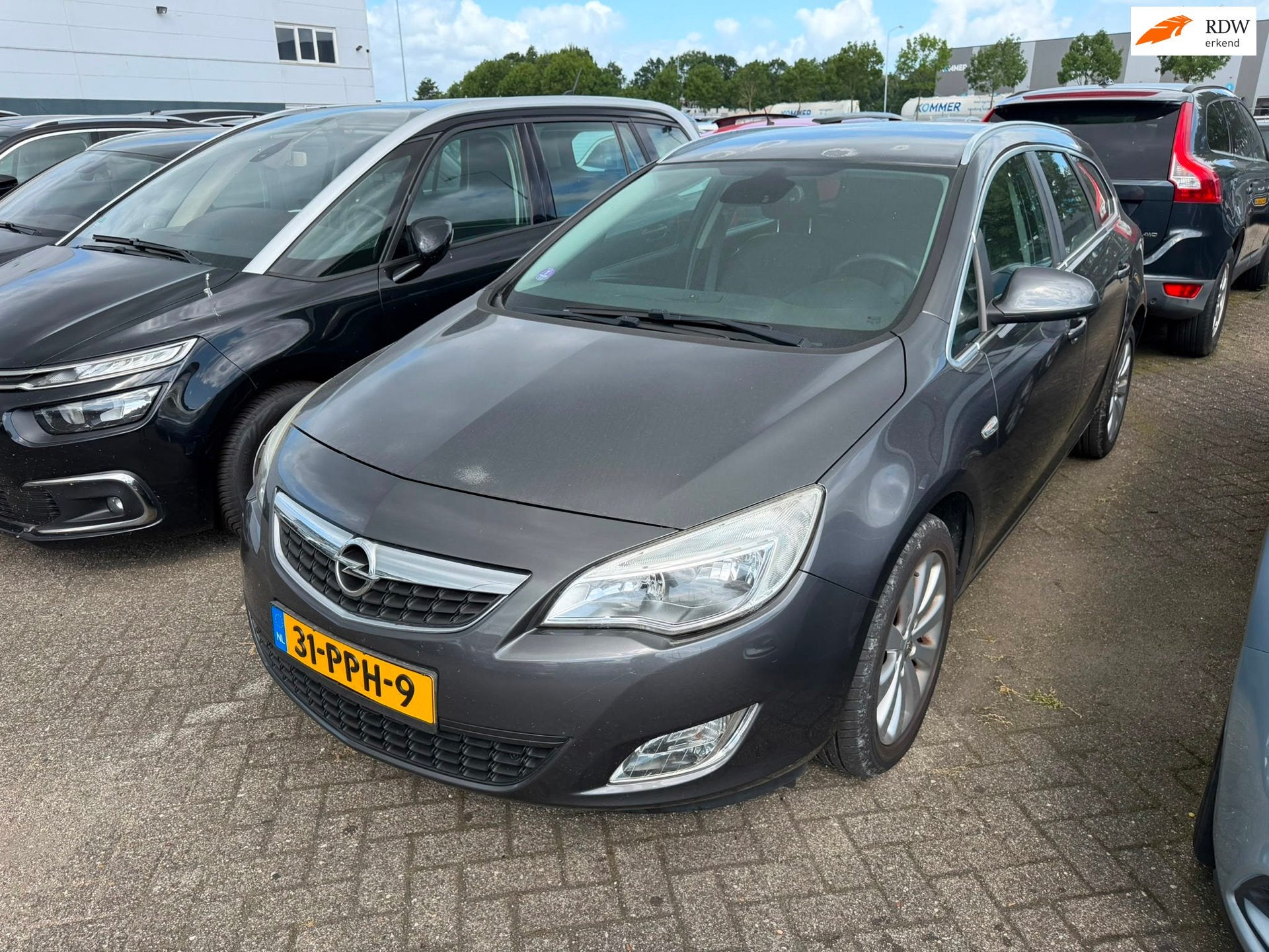 Opel Astra Sports Tourer 1.4 Turbo Cosmo, Auto's, Opel, Voorwielaandrijving, Euro 5, Gebruikt, 4 cilinders