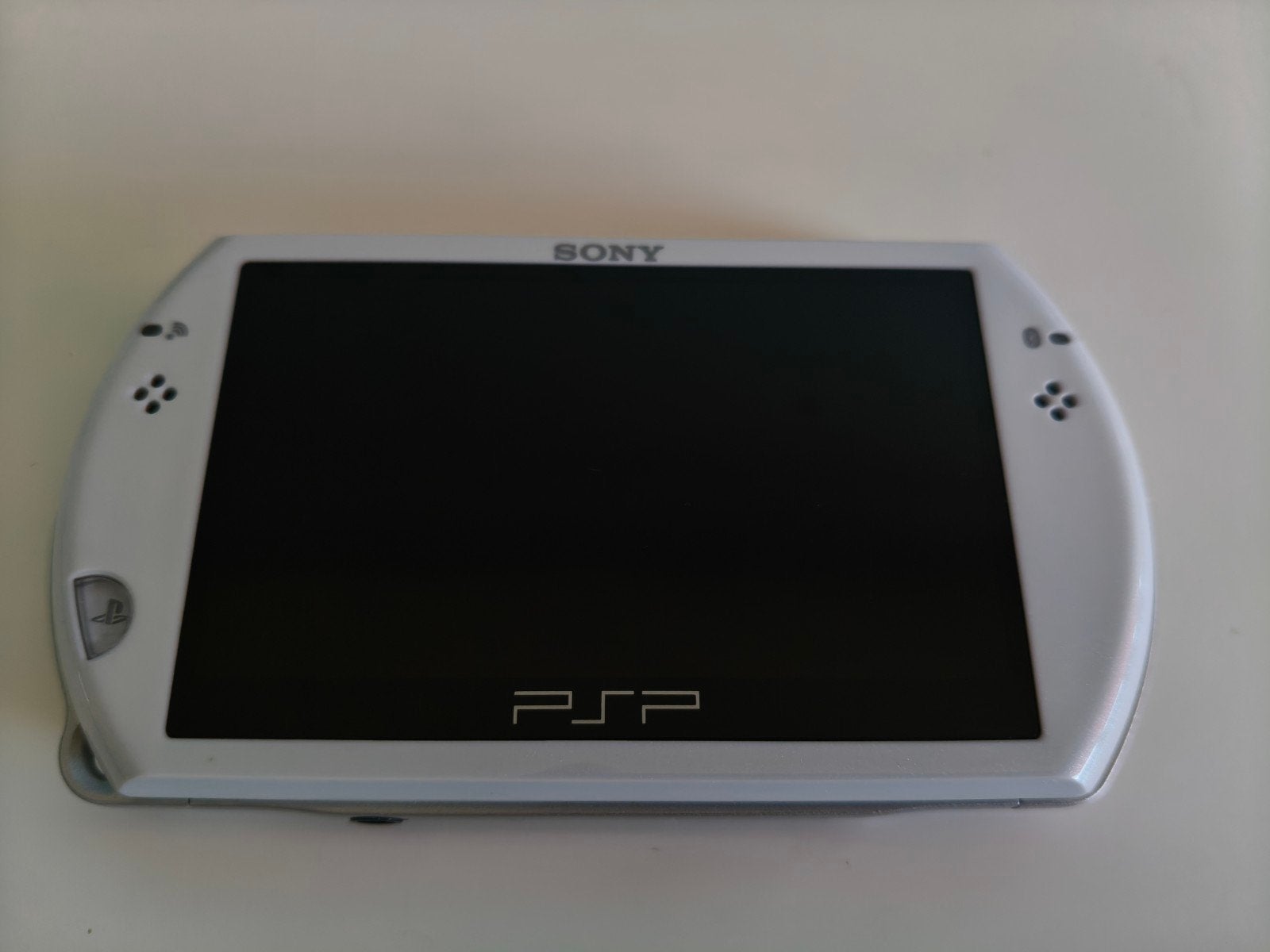 SONY PSP GO Pearl White nieuwstaat krasvrij, Ophalen of Verzenden, Zo goed als nieuw, Wit