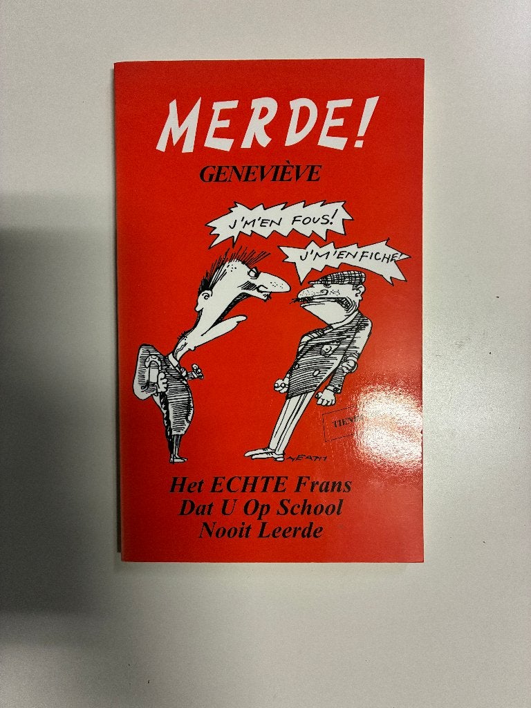Merde! Genevieve, Ophalen of Verzenden, Zo goed als nieuw