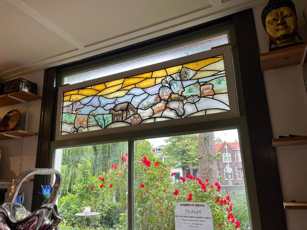 Mooi geschilderd glas in lood, Ophalen