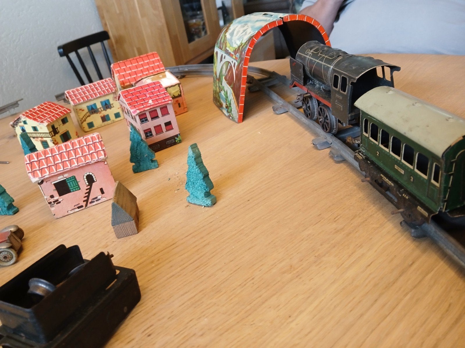 Antieke blikken opwindtrein met rails en accessoires (1935), Ophalen