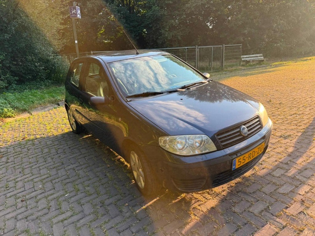 Fiat Punto 1.2 3DR 2005 Grijs, Voorwielaandrijving, Stof, 4 cilinders, Origineel Nederlands