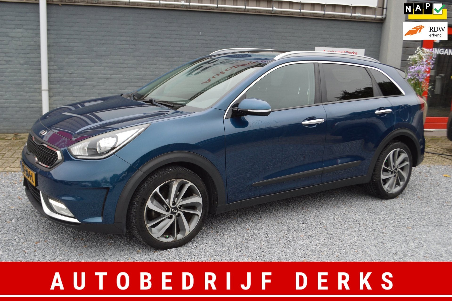 Kia Niro 1.6 GDi Hybrid Design Edition | Airco | Leer | Navi, Auto's, Gebruikt, Euro 6, Blauw, Leder en Stof