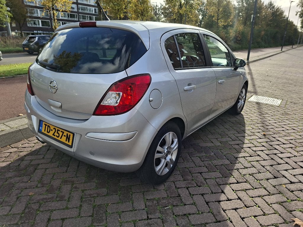 Opel Corsa 1.4 16V 5D AUT 2011 Grijs, Auto's, Automaat, Isofix, Stof, 1398 cc