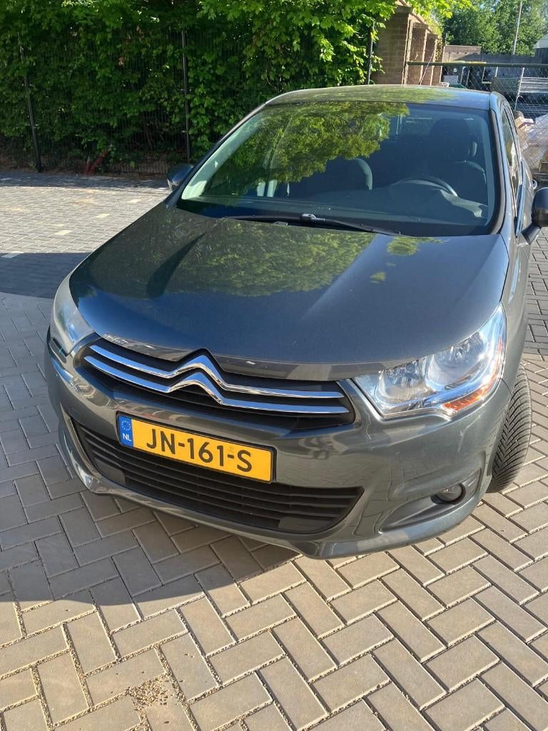 Citroën C4 1.6 VTI Berline 2011 Grijs, Auto's, Citroën, Voorwielaandrijving, 1550 kg, 4 cilinders, Leder en Stof