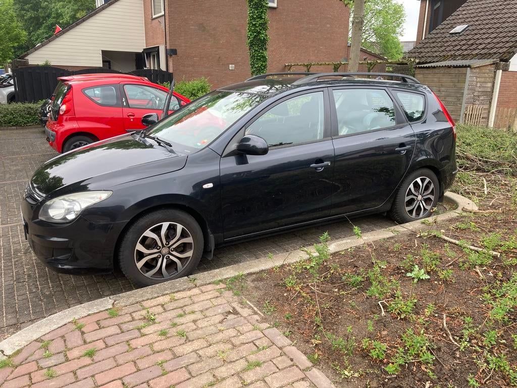 Hyundai i30 1.4 I Cvvt Crosswagon 2009 Zwart, Voorwielaandrijving, Stof, Zwart, 1396 cc