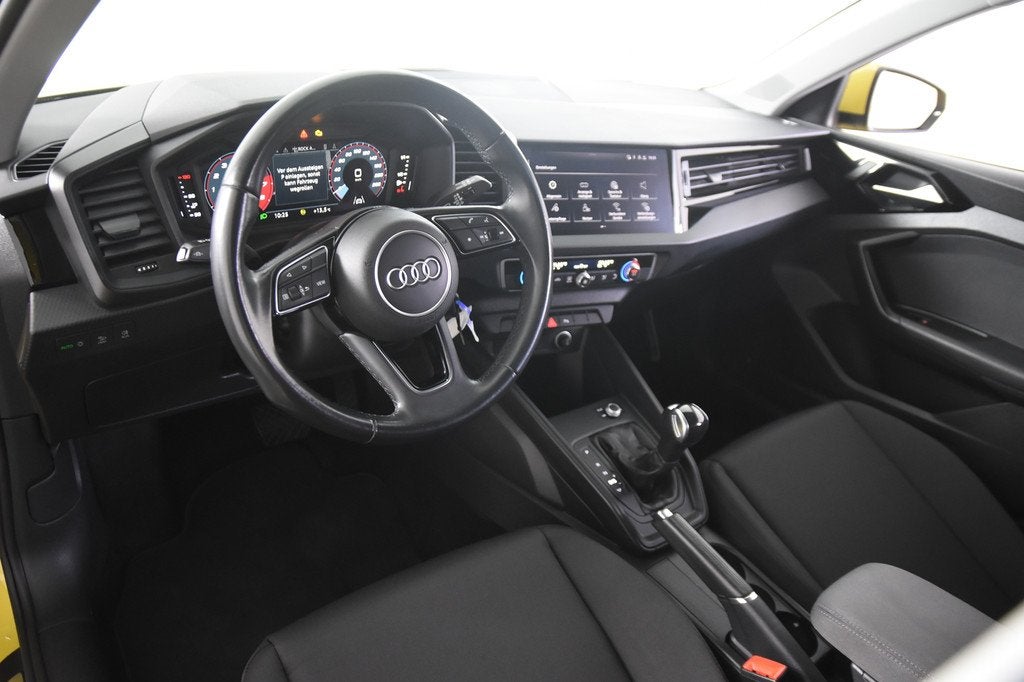 Audi A1 Sportback 25 TFSI edition *1ste Eigenaar*Navigatie*P, Auto's, Audi, Stof, Geel, Bedrijf, 3 cilinders