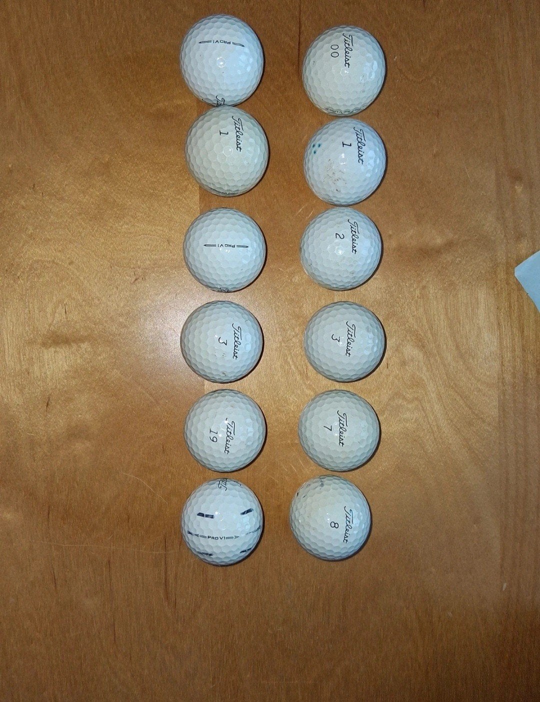 12 Titleist pro v1 golfballen, Sport en Fitness, Golf, Ophalen of Verzenden, Zo goed als nieuw, Bal(len)