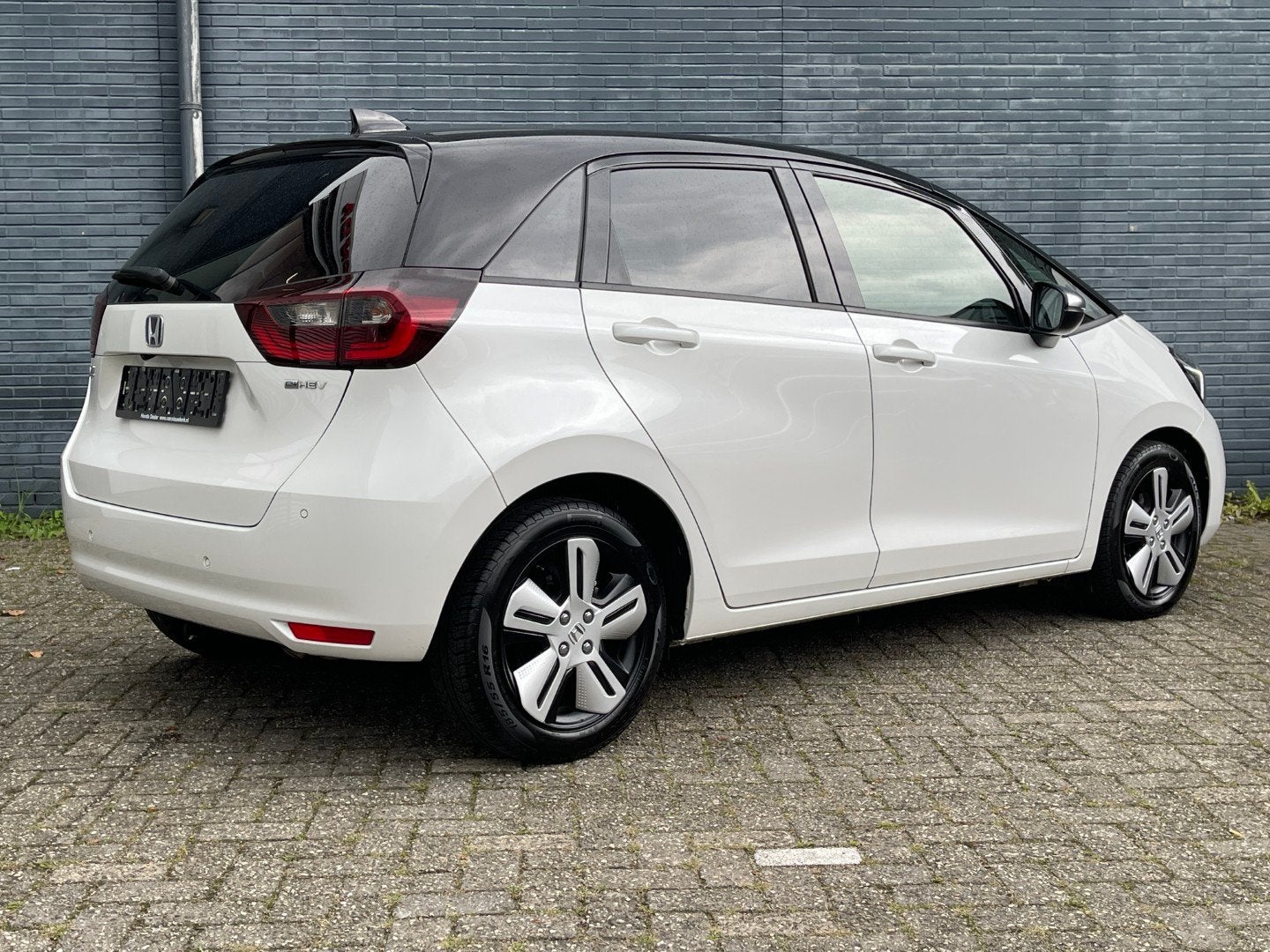 HONDA Jazz 1.5 i-MMD 109pk Hybrid Automaat Executive | Navi, 12 maanden, Euro 6, Leder en Stof, Wit