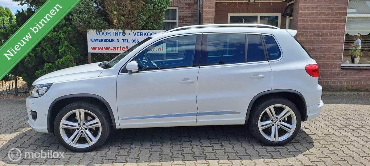 Volkswagen Tiguan 1.4 TSI R-Line ORIGINEEL HOLLANDSE AUTO!, Auto's, Volkswagen, Te koop, Tiguan, ABS, Achteruitrijcamera, Airbags