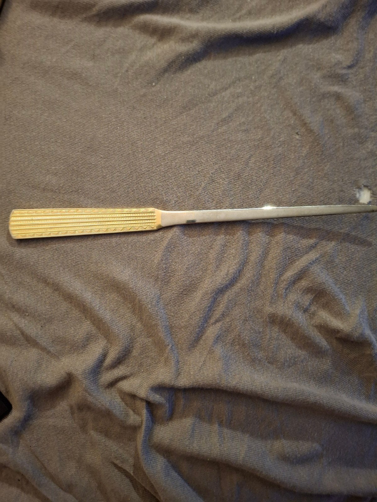 Vintage briefopener met decoratief handvat, Ophalen