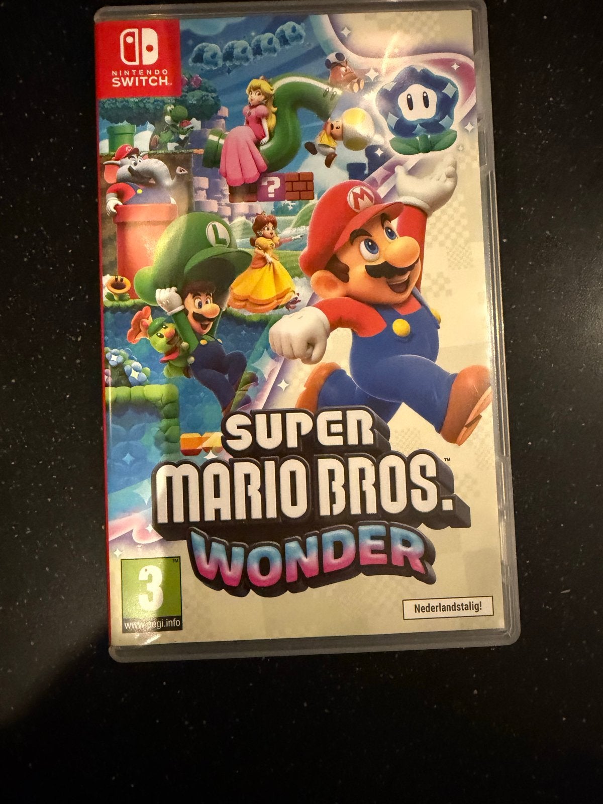 Super Mario Bros. Wonder - Nintendo Switch (Nederlandstalig), Spelcomputers en Games, Eén computer, Ophalen of Verzenden, Zo goed als nieuw
