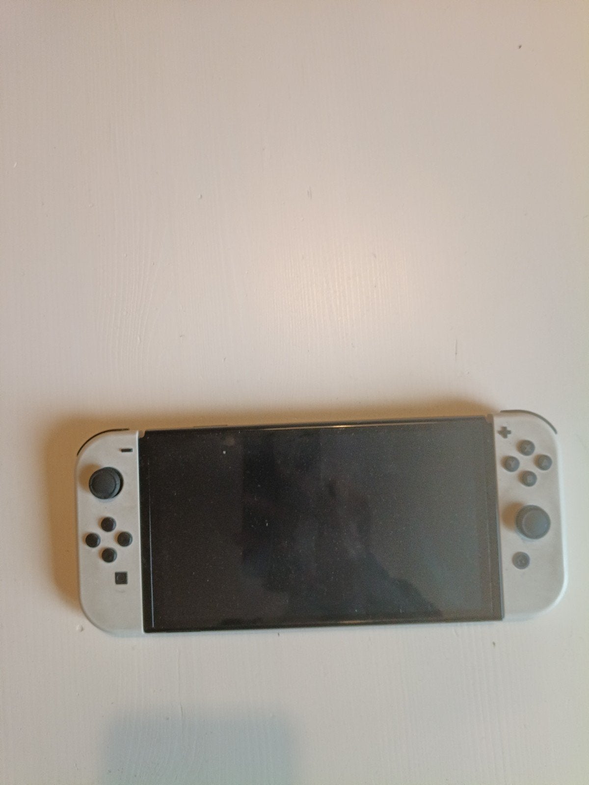 Nintendo Switch OLED met 3 controllers en draagtas