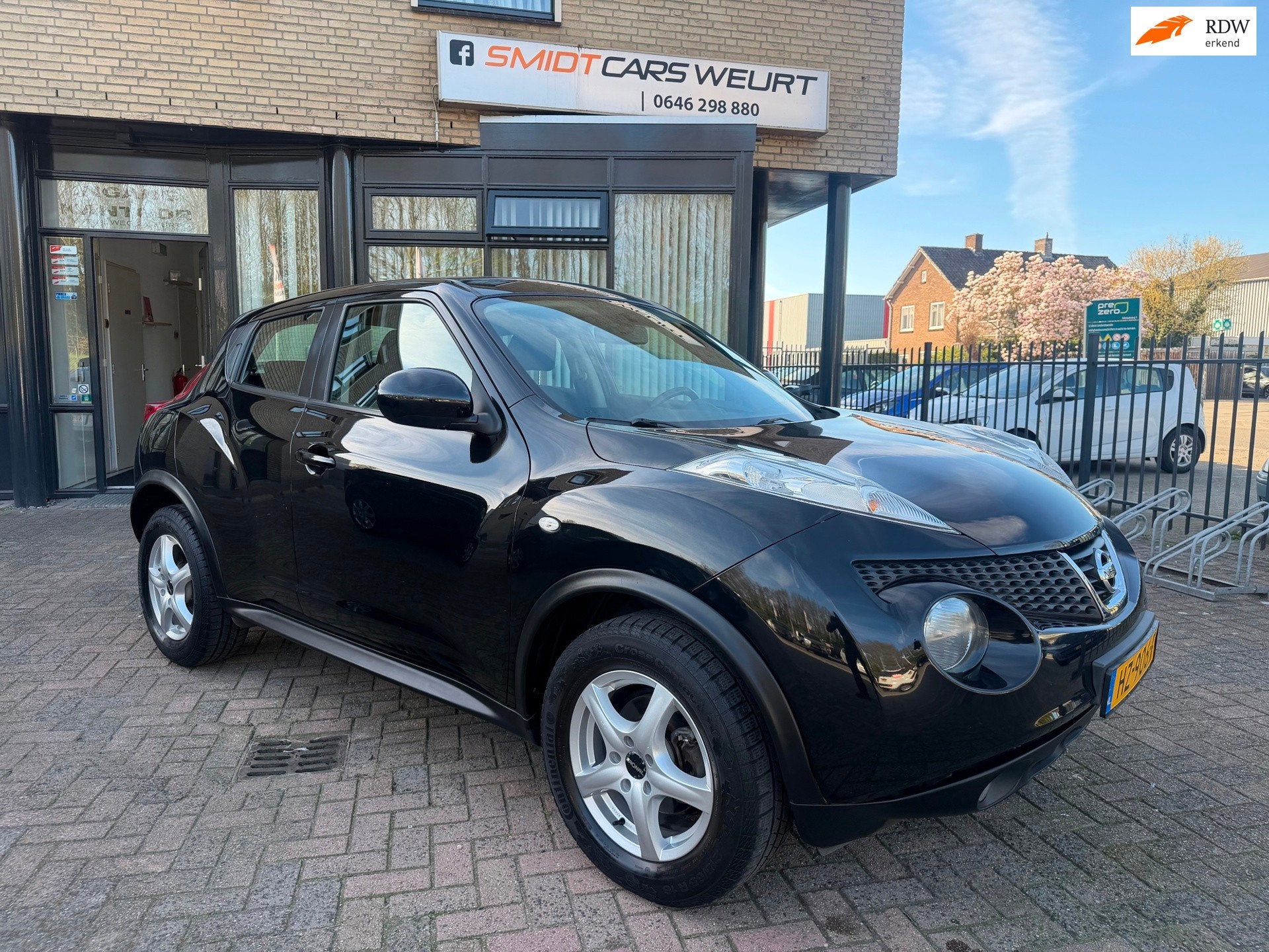 Nissan Juke 1.6 Acenta Climate Navi Cruise, Voorwielaandrijving, Euro 5, Stof, Zwart
