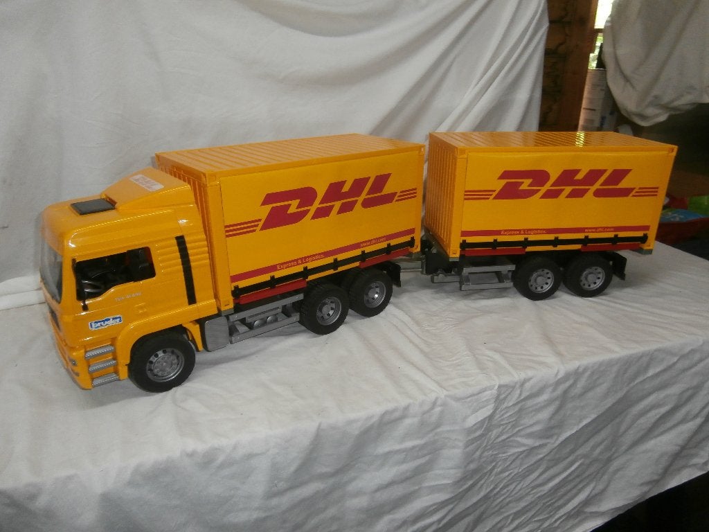 Bruder MAN TGA DHL truck met aanhanger - Nieuwstaat, Ophalen, Zo goed als nieuw