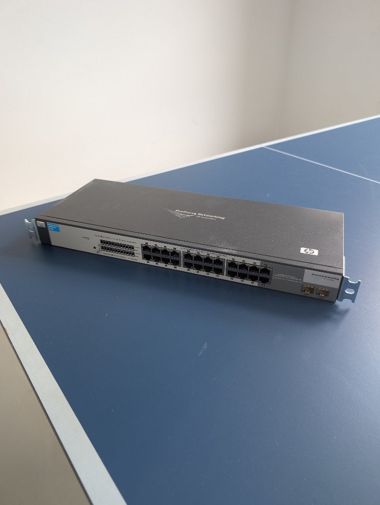 HP ProCurve 1800-24G gigabit switch, Computers en Software, Netwerk switches, Ophalen, Gebruikt